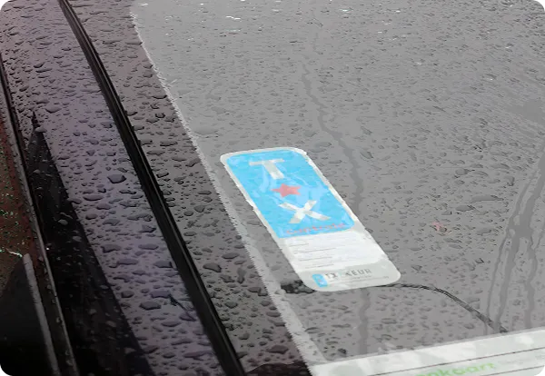 TX certifications badge on car